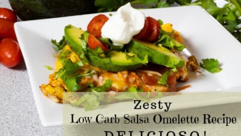 A plate of food on a table, with Omelette and Salsa