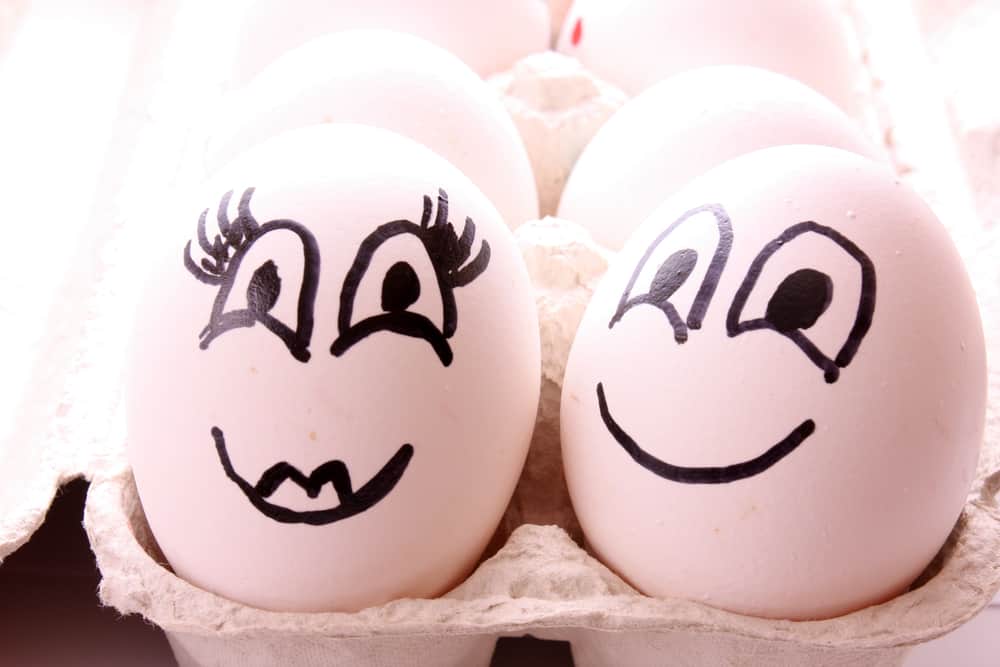 2 eggs with funny drawn faces