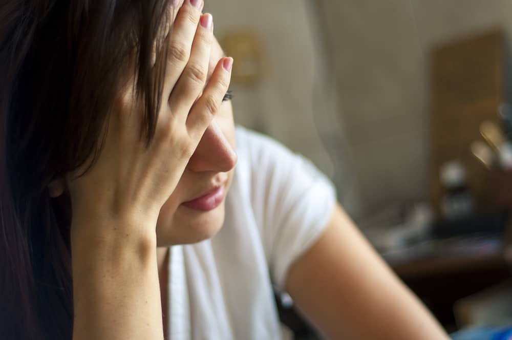 woman with keto flu headache