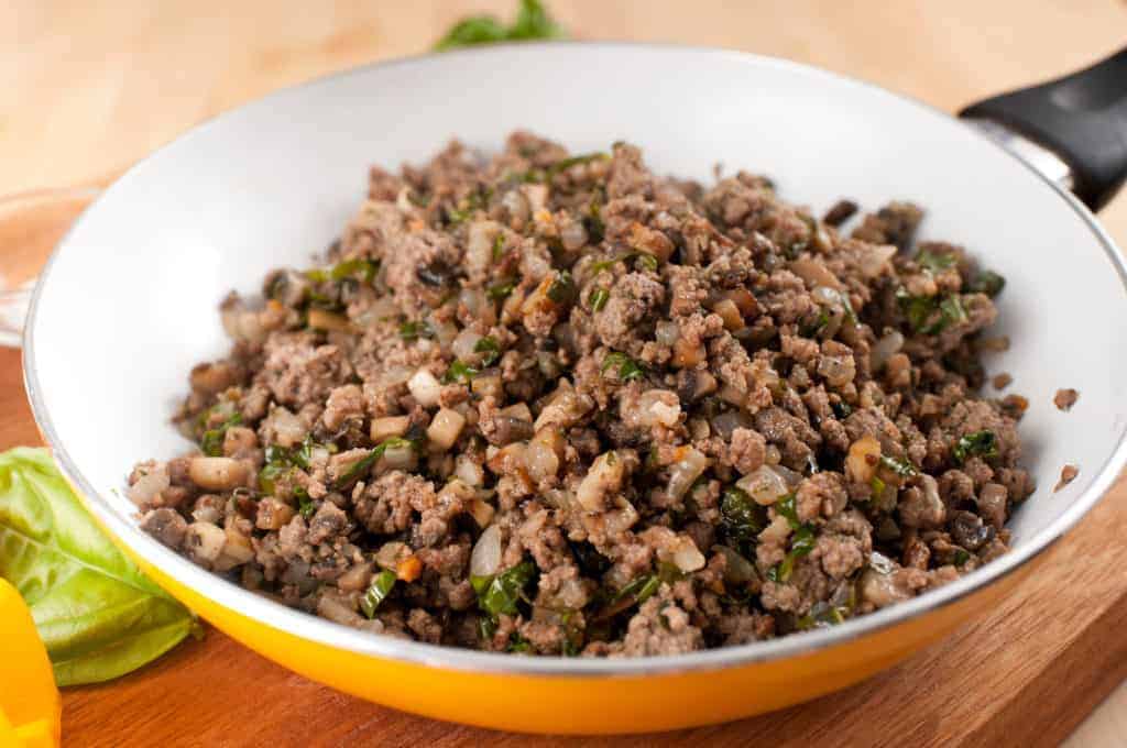 frying pan with cooked ground beef