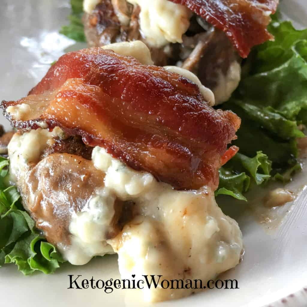 A close up of a plate of food with broccoli, with Slider and Bacon