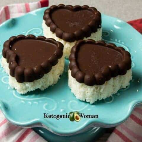heart shaped keto chocolate coconut bars on blue plate