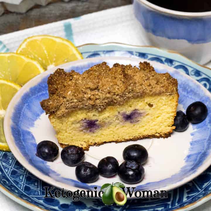 Coffee with Low Carb Lemon Blueberry Coffeecake with a crumb topping on blue and white plate set
