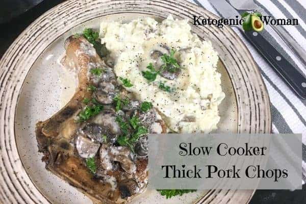 pork chops and cauliflower mash on plate
