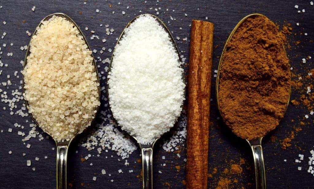 sugar and sweeteners in spoons