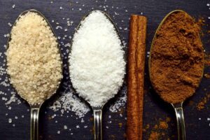 sugar and sweeteners in spoons