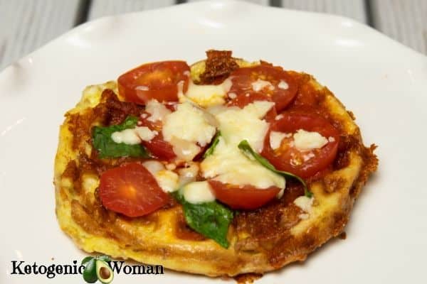 https://ketogenicwoman.com/wp-content/uploads/2020/04/Chaffle-Pizza-Tomato-Basil-and-Feta.jpg