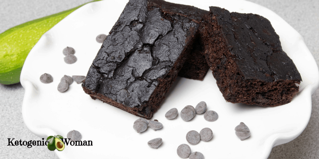 closeup of hand holding a Keto chocolate brownie