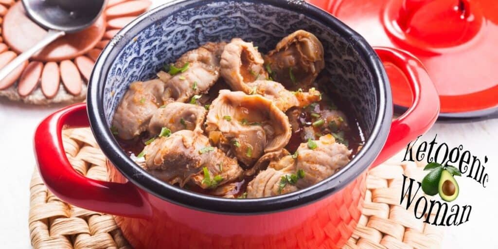 cooked gizzards in a red pot