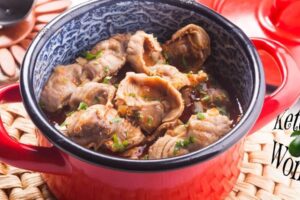 cooked gizzards in a red pot
