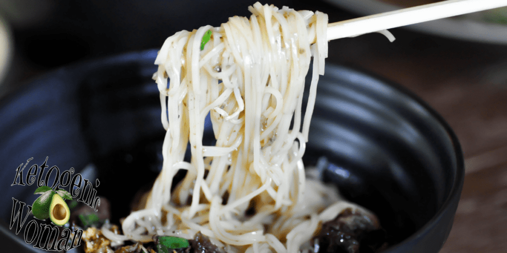 Noodles in black bowl