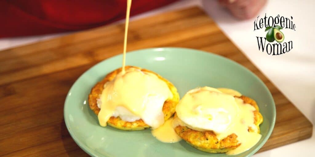 Pouring sauce over eggs benedict